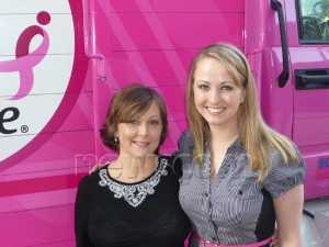 Emily Custer and Gina Schroeder in front of DS Waters' pink truck at the 2010 Komen Affiliate Leadership Conference in Dallas, Texas. (PRNewsFoto/DS Waters)