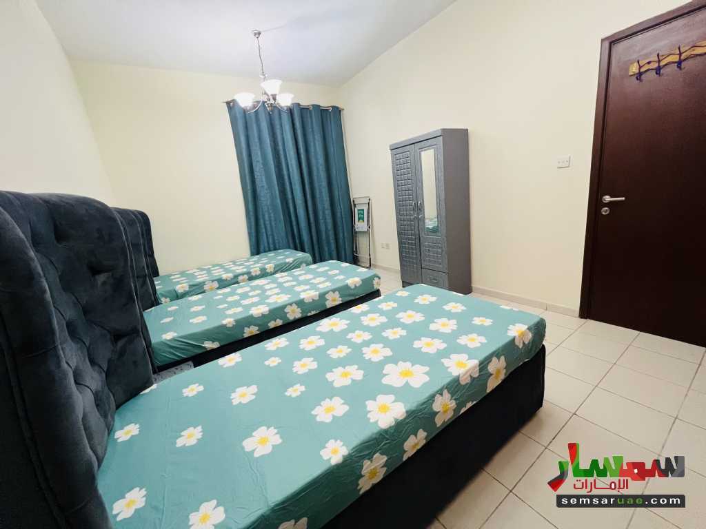 By Photos Bedspace for Boys in international city France Cluster Dubai