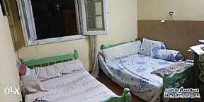 <ar>سرير غرفة مشاركة لموظف في زهراء مدينة نصر</ar>