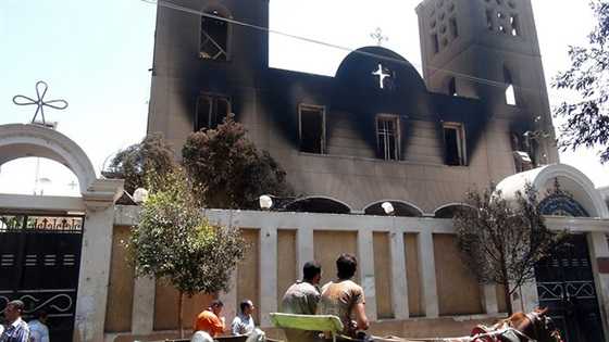 صورة توضح حرق الكنائس خلال المسيرات الخاصة بالاخوان