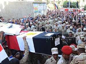 كفر الشيخ تشيع شهيدي الشرطة في جنازة عسكرية