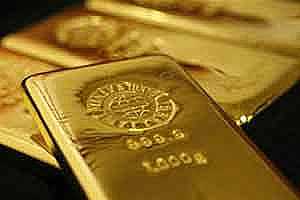 أسعار الذهب تواصل انخفاضها إلى أقل من 1557 دولاراً للأوقية